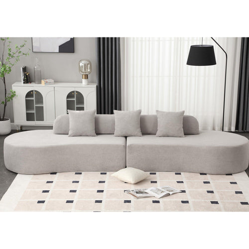 Contemporary Gray Polyester Curved Sofa With Pillows.