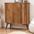 Wooden cabinet with a warm brown finish in a room setting.