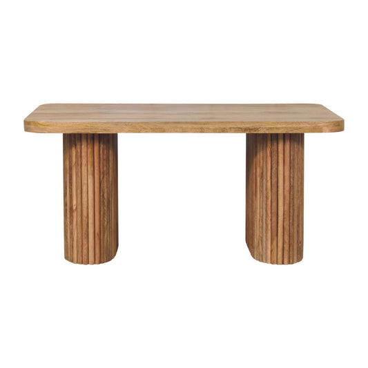 Wooden table with cylindrical legs on a white background