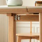Elegant Light Oak Solid Wood Extending Dining Table.