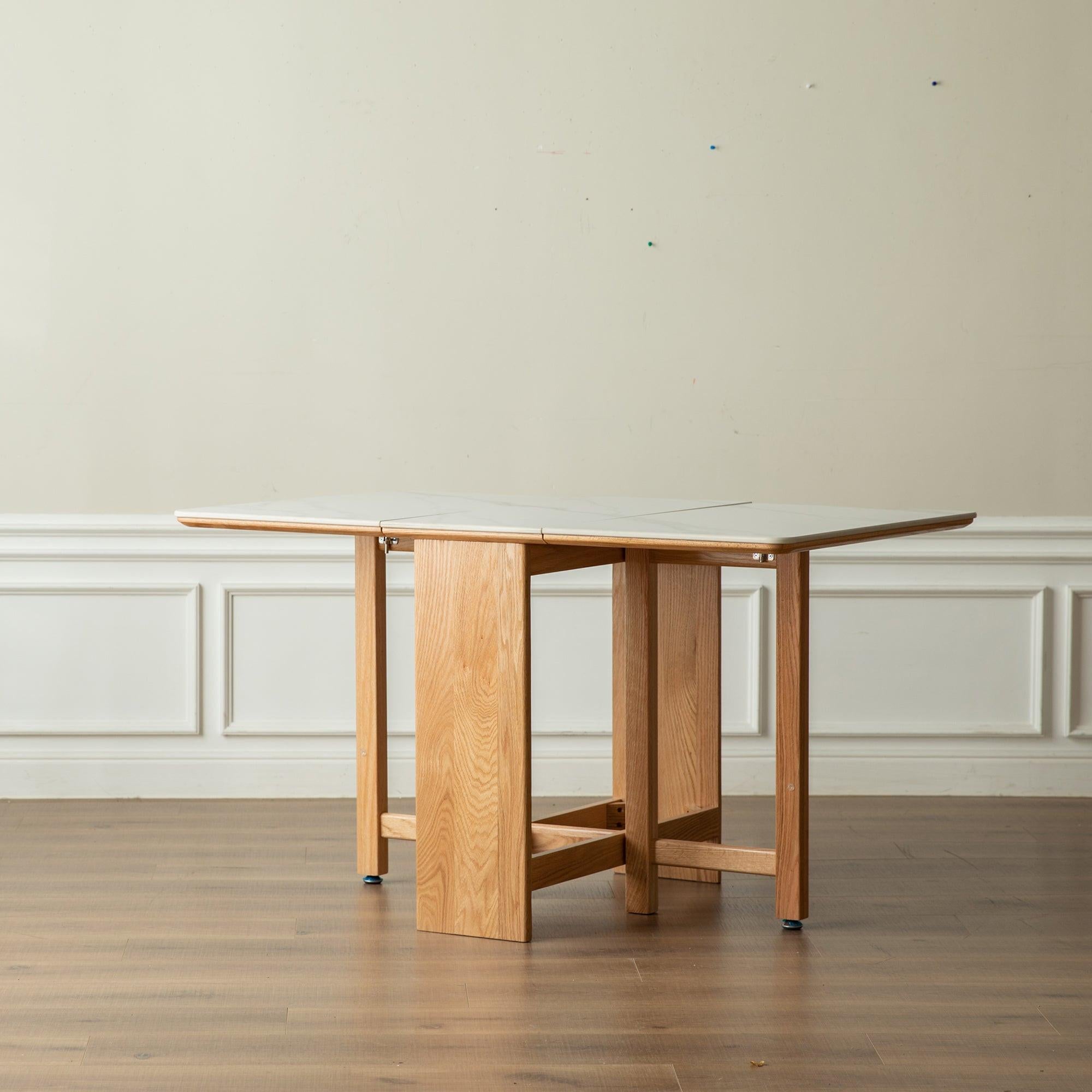 Elegant Light Oak Solid Wood Extending Dining Table.