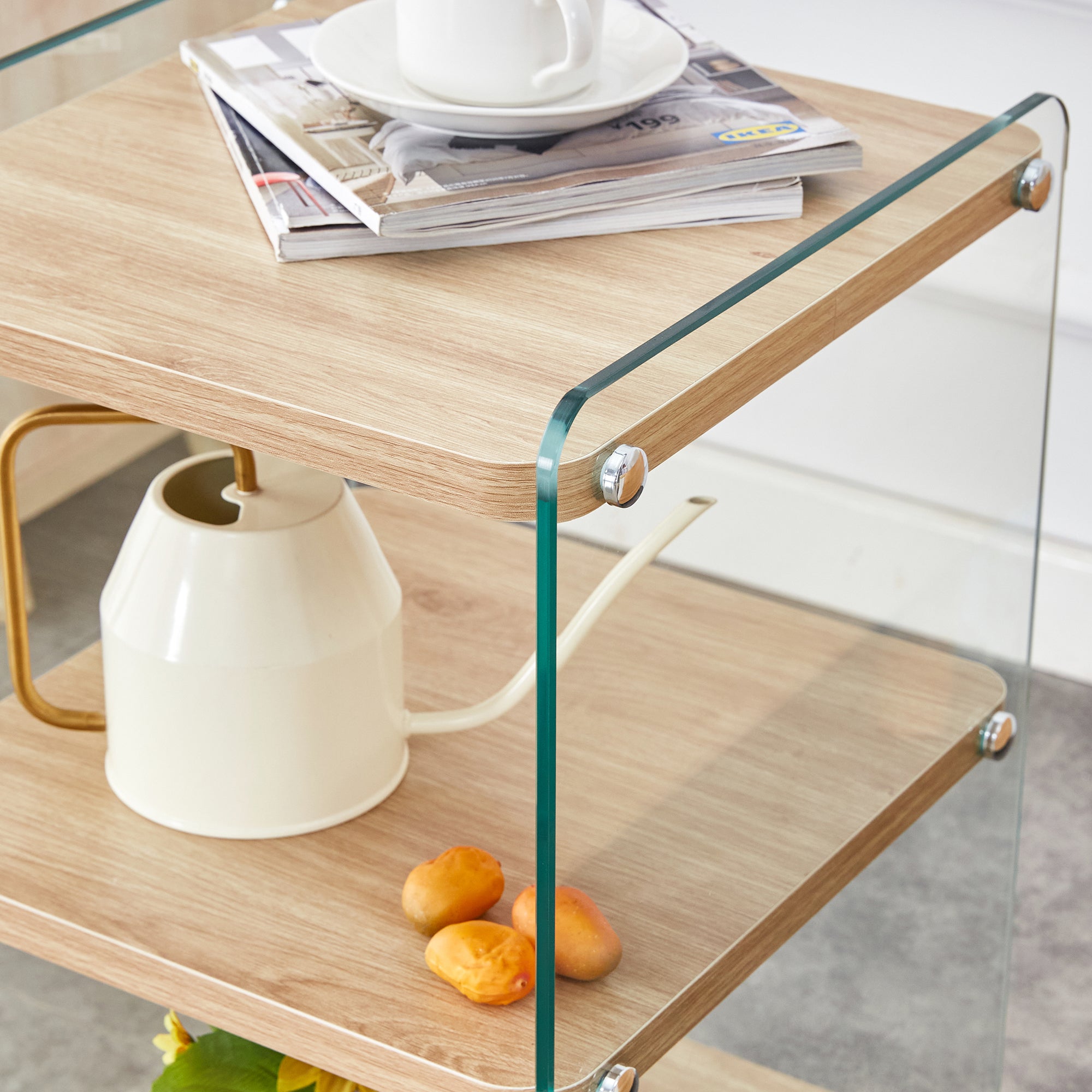 Three layer bedside cabinet.The board is made of MDF with wooden stickers, with transparent tempered glass on both side.The design is simple and elegant, with powerful storage function.Storage cabinet