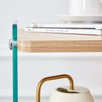 Three layer bedside cabinet.The board is made of MDF with wooden stickers, with transparent tempered glass on both side.The design is simple and elegant, with powerful storage function.Storage cabinet