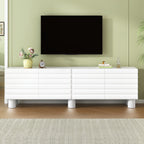 Stylish Thick Wavy Door TV Cabinet with Adjustable Shelves, Cream Style TV Stand with 4 Cabinets for TVs Up to 75', Solid Media Console with Cylindrical Legs and Cable Holes for Living Room, White