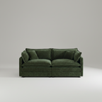 Green sofa on a light gray background