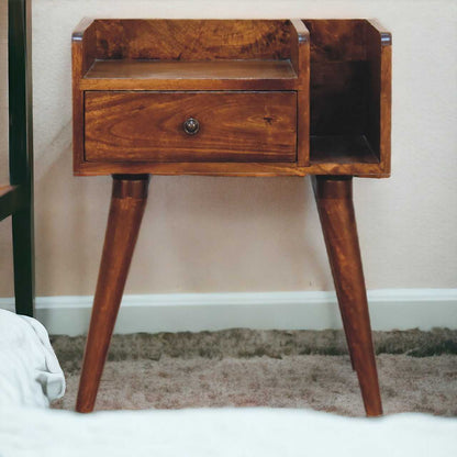 Wooden nightstand with a single drawer on a neutral background