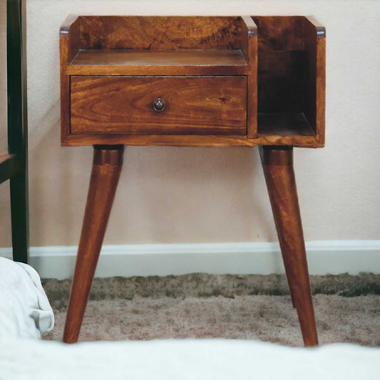 Wooden nightstand with a single drawer on a neutral background