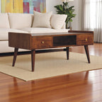Wooden coffee table with drawers in a living room setting