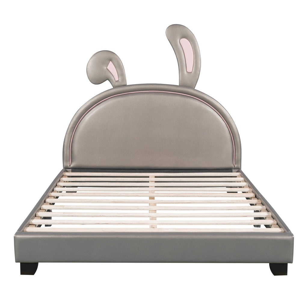 Leather Upholstered Platform Bed with Rabbit Accent.