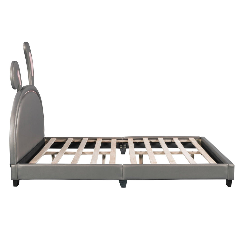 Leather Upholstered Platform Bed with Rabbit Accent.