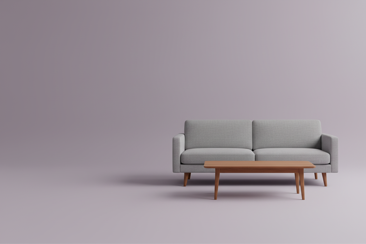 Gray sofa with a wooden coffee table on a plain background