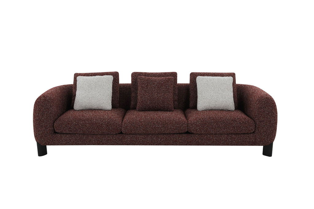 Brown and cream sofa with gray cushions on a white background