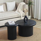 Modern Black Round Coffee Table With Fluted Legs.