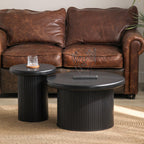 Modern Black Round Coffee Table With Fluted Legs.