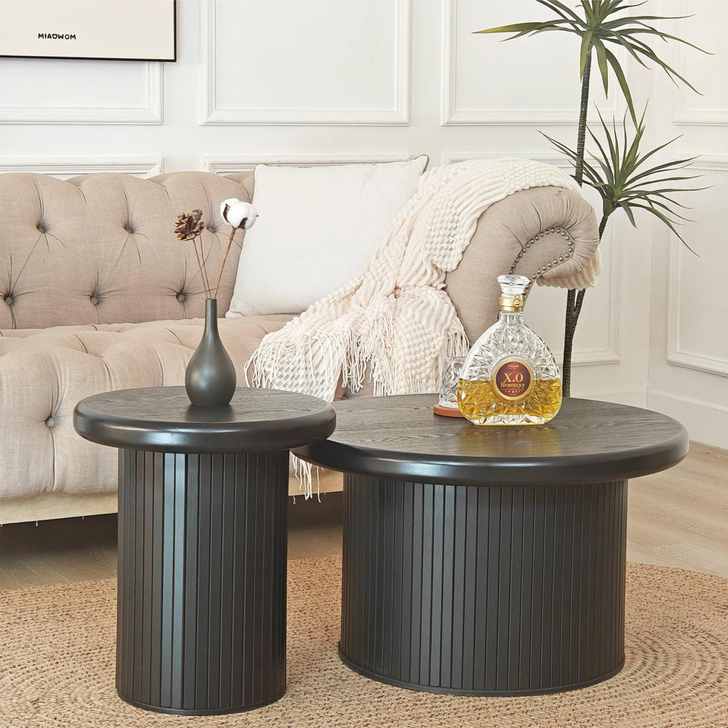 Modern Black Round Coffee Table With Fluted Legs.