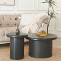 Modern Black Round Coffee Table With Fluted Legs.