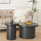 Modern Black Round Coffee Table With Fluted Legs.