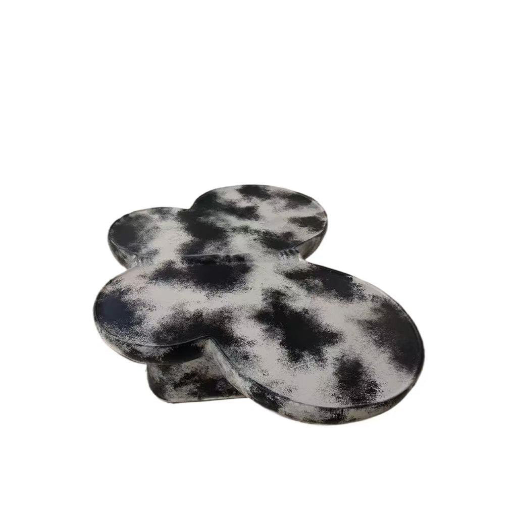 Butterfly design style, coffee table, imitation natural limestone material, suitable for living room/office, fiberglass, black and beige combination.