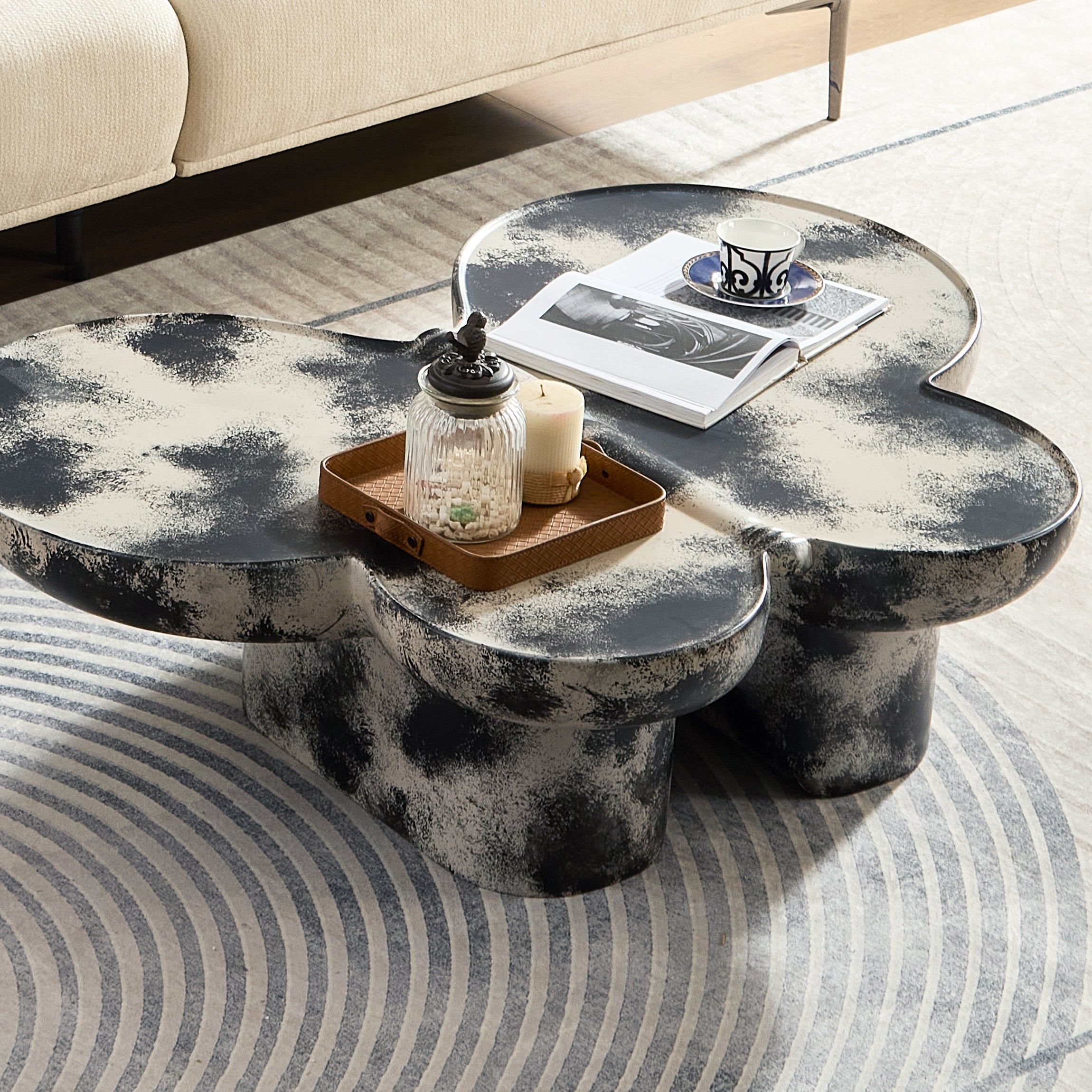 Butterfly design style, coffee table, imitation natural limestone material, suitable for living room/office, fiberglass, black and beige combination.