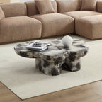 Butterfly design style, coffee table, imitation natural limestone material, suitable for living room/office, fiberglass, black and beige combination.