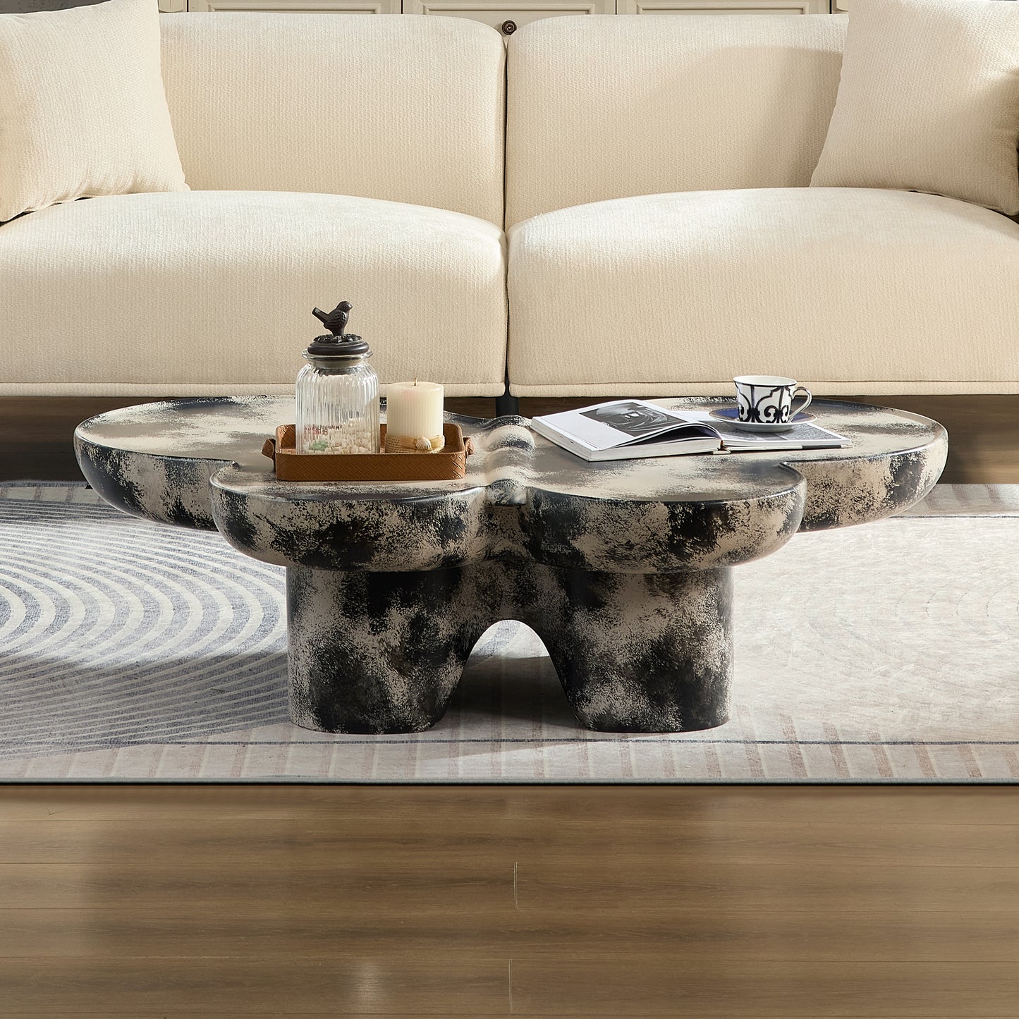 Butterfly design style, coffee table, imitation natural limestone material, suitable for living room/office, fiberglass, black and beige combination.