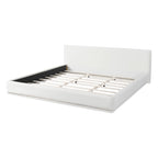 Soft and comfortable upholstered bed. Luxurious and cozy bedroom centerpiece, king size, white Bed Frame