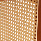 A natural and elegant deep red wooden coffee table with artificial rattan decorations, perfect for a fashionable living room and comfortable tea drinking time