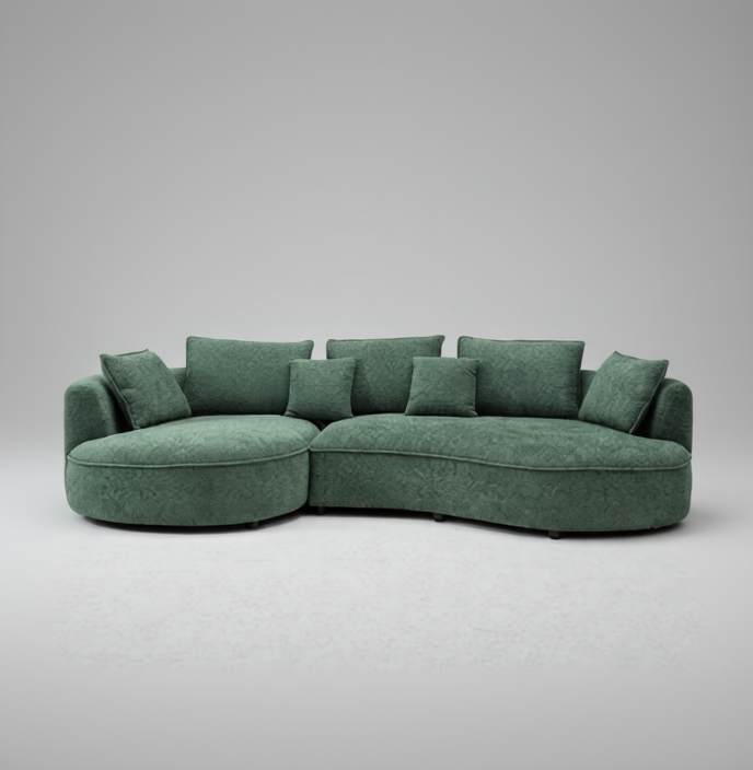 Green sectional sofa on a light gray background