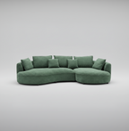 Green sectional sofa on a light gray background