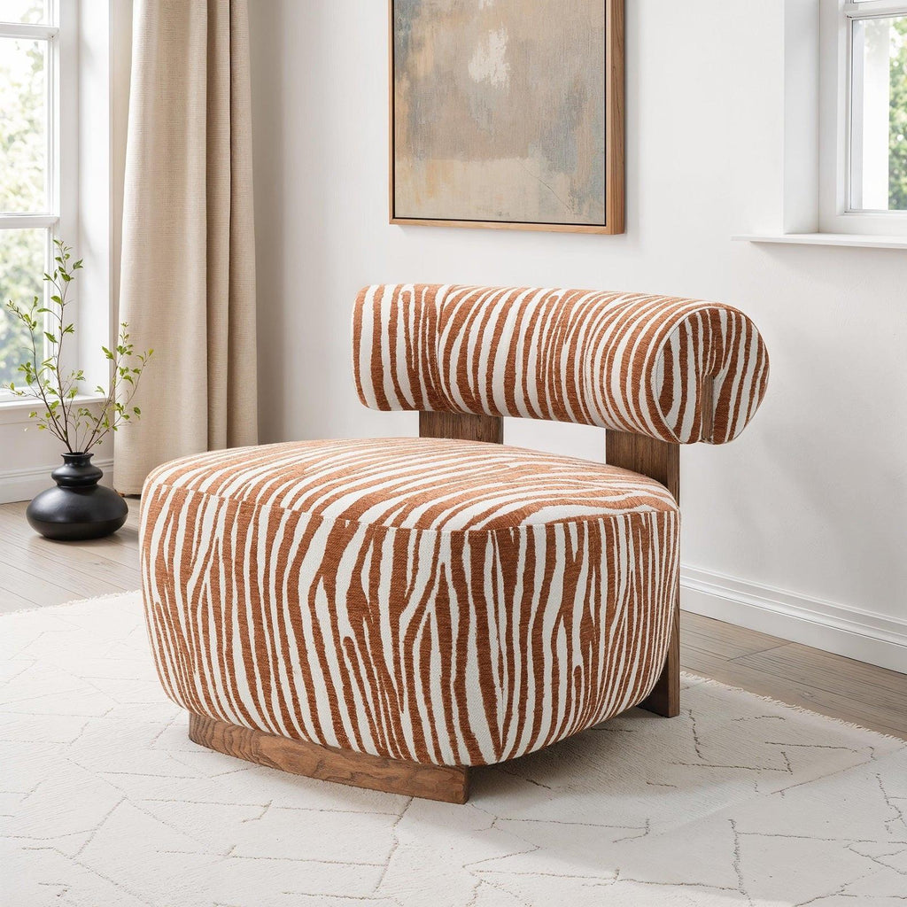 Chair with zebra print pattern in a room with light-colored walls and flooring.