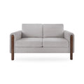Gray sofa with wooden armrests on a white background