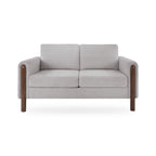 Gray sofa with wooden armrests on a white background