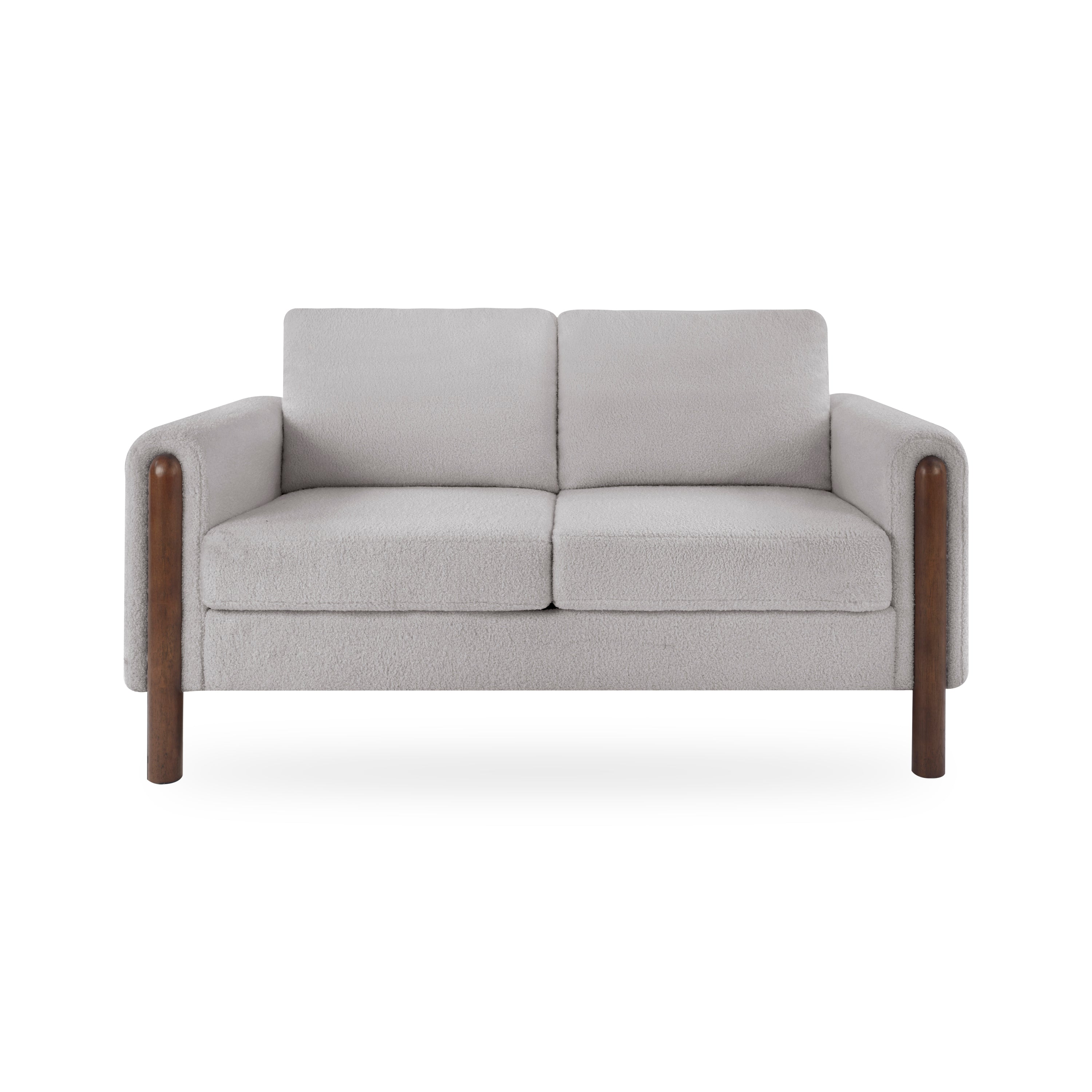 Gray sofa with wooden armrests on a white background