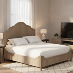 Neatly made bed with wooden headboard in a bedroom setting.