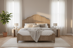 Wooden bed with bedding in a well-lit bedroom