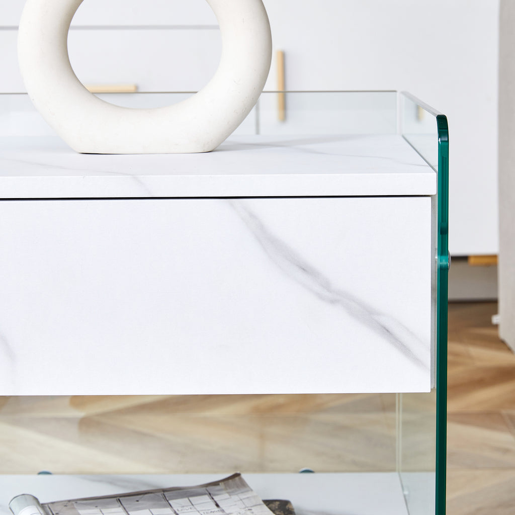 Bedside table with drawers. The board surface is MDF sticker, and both sides are transparent tempered glass. The design is simple and elegant, with excellent storage functions.