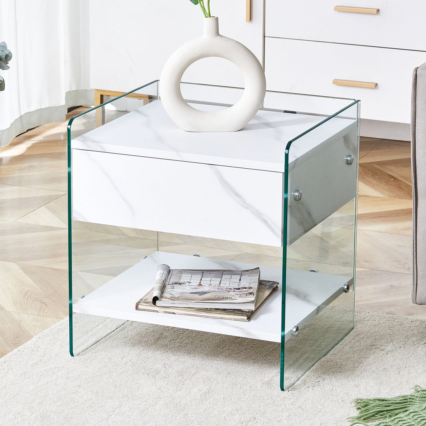 Bedside table with drawers. The board surface is MDF sticker, and both sides are transparent tempered glass. The design is simple and elegant, with excellent storage functions.