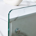Bedside table with drawers. The board surface is MDF sticker, and both sides are transparent tempered glass. The design is simple and elegant, with excellent storage functions.