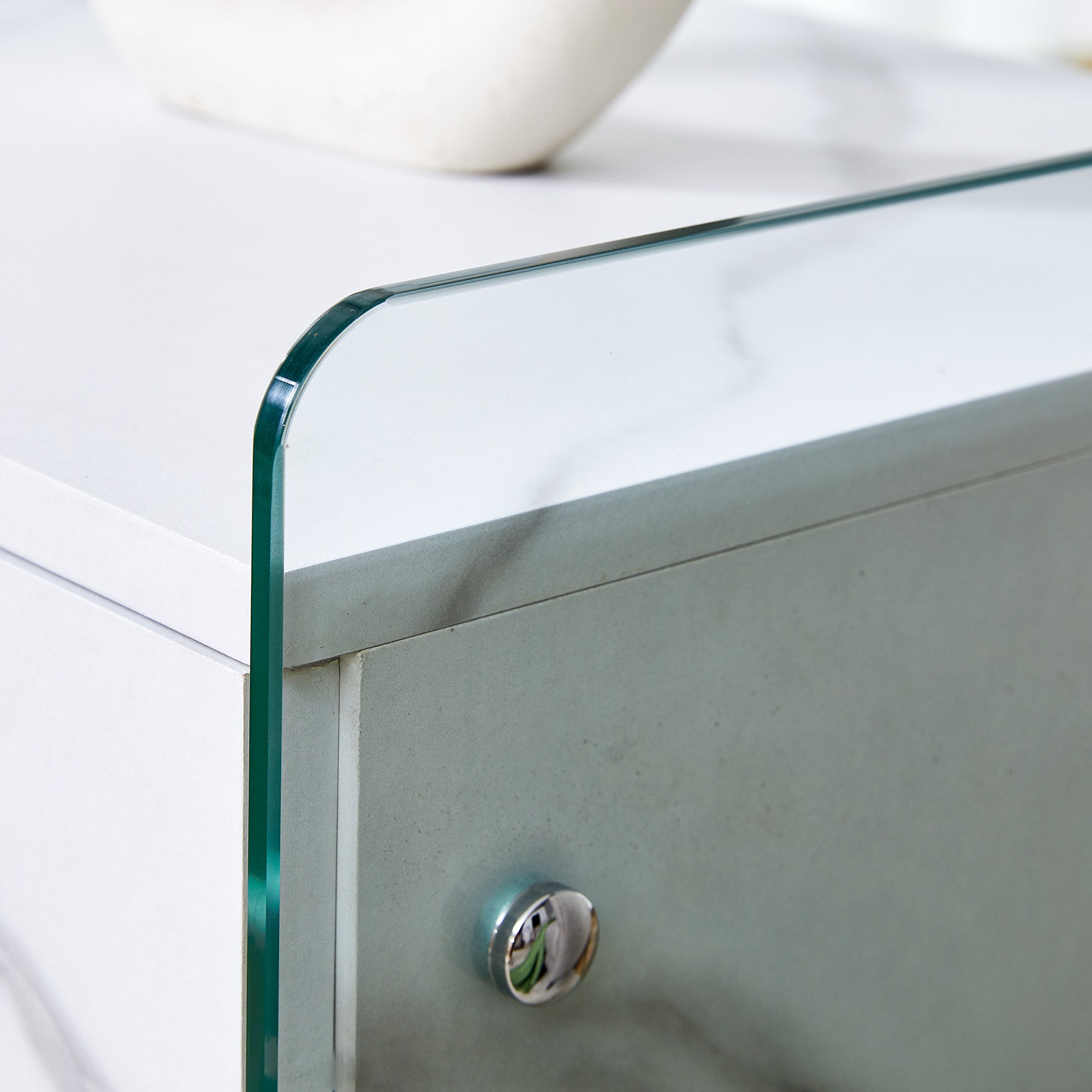 Bedside table with drawers. The board surface is MDF sticker, and both sides are transparent tempered glass. The design is simple and elegant, with excellent storage functions.