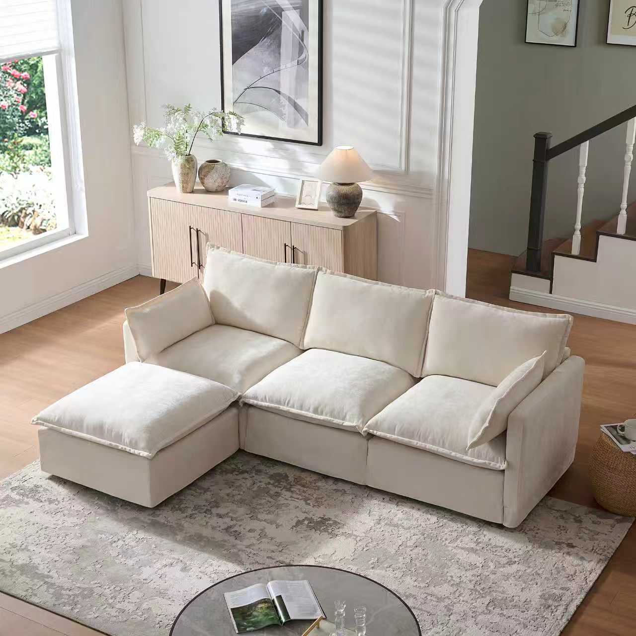 93.31' Modular Sectional Sofa - Modern Design in cream color with ottoman, placed in a bright living room with wood flooring and neutral decor.