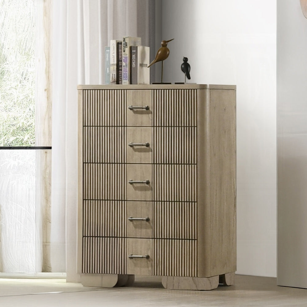 Oak Chest with 5 Drawers - Bedroom Storage shown in a modern bedroom with decor, featuring antique oak finish and vertical groove detailing.