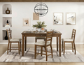 Five-piece cherry wood counter-height dining set with storage drawers and four upholstered ladder-back chairs.