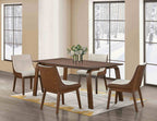 Dining room scene with four Mid-Century Modern Side Chairs around walnut table, showcasing padded seats and stylish wood finish.