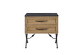 Cashew-colored wood nightstand with two drawers, dark textured top, and decorative wrought-iron legs against white.