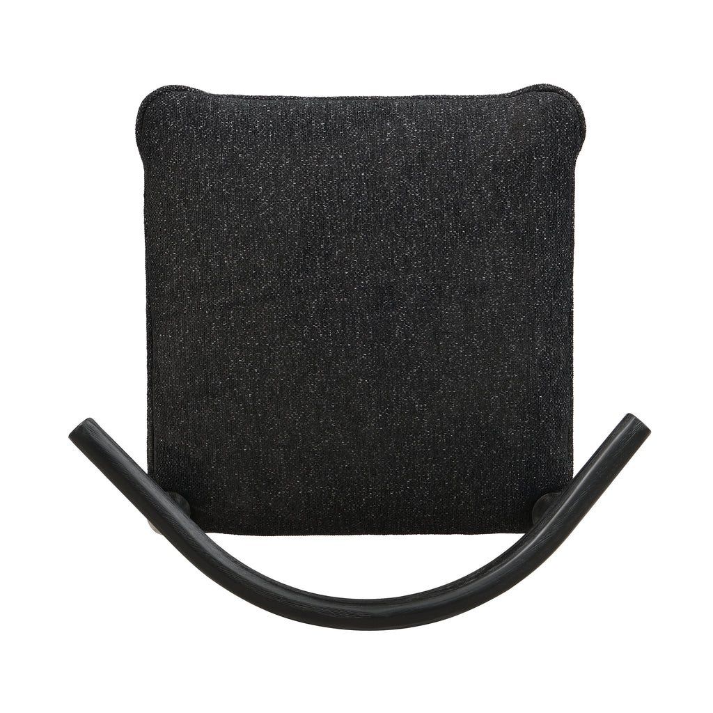 Top-down view of black fabric bar stool seat and curved backrest, displaying textured upholstery and ergonomic design.