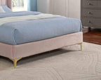 Light Pink Queen Bed with Wingback Headboard.