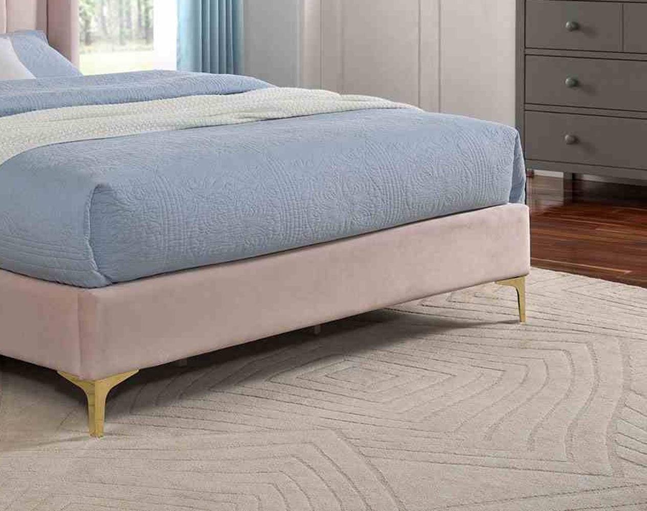 Light Pink Queen Bed with Wingback Headboard.