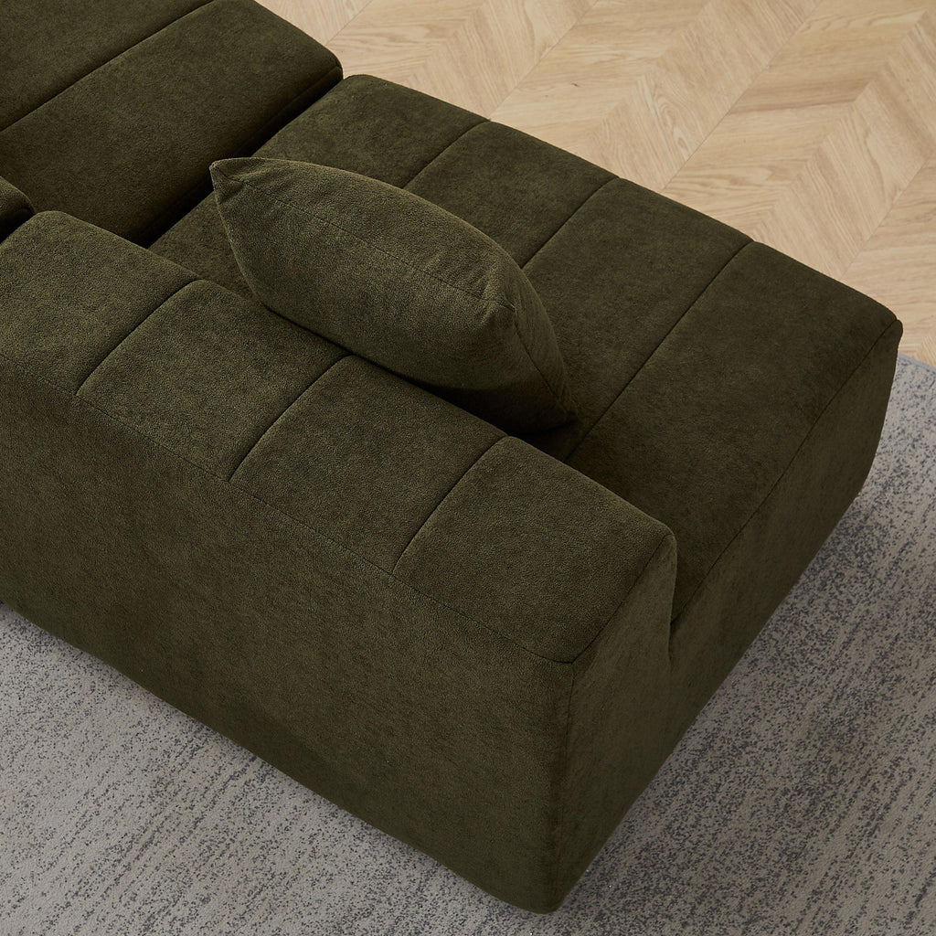 Curved Sectional Sofa with 4 Pillows for Comfortable Seating.