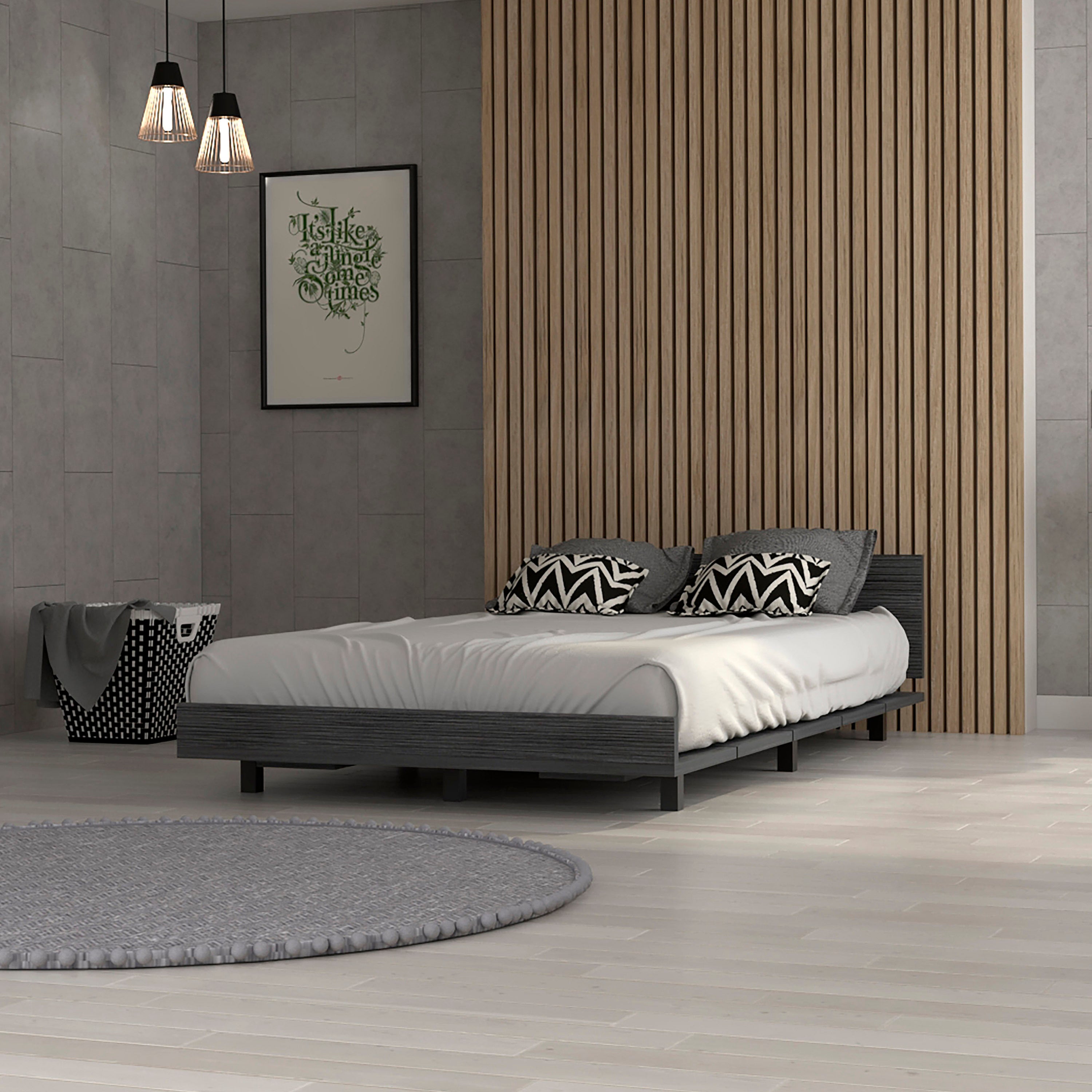 Nimmo twin bed frame in smokey oak with a low-profile, modern minimalist design set against a wood slat wall.