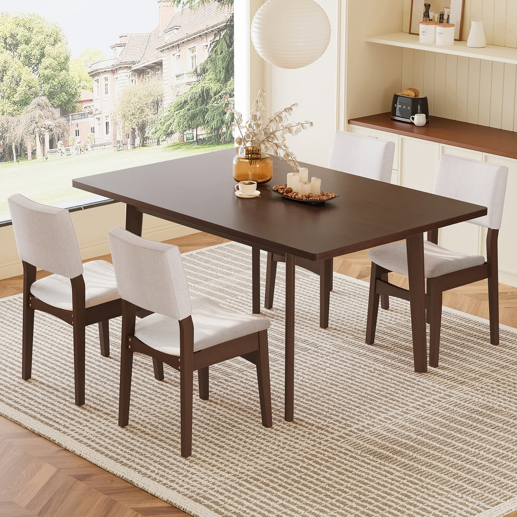 Modern wood dining table with four upholstered chairs on a striped rug. Elegant and compact for space-saving dining solutions.